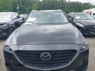 2022 Mazda CX-9 Touring Plus z VIN JM3TCBAY2N0619279, wystawiony jako IAAI lot #42373722 z przebiegiem 43 540 mil mil oraz . Historia ofert i sprzedaży dostępna na DreamBid. Obrazek 12.
