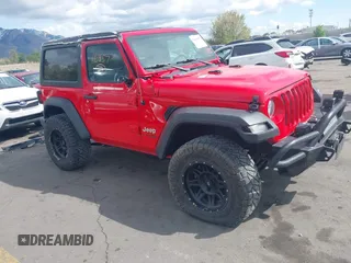 2019 Jeep Wrangler Sport S z VIN 1C4GJXAG4KW652569, wystawiony jako IAAI lot #42116457 z przebiegiem 46 007 mil mil oraz . Historia ofert i sprzedaży dostępna na DreamBid. Obrazek 1.