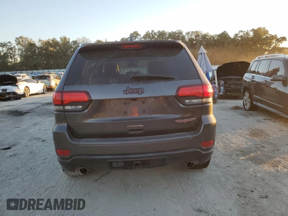 2020 Jeep Grand Cherokee Trailhawk z VIN 1C4RJFLT6LC417087, wystawiony jako Copart lot #82244724 z przebiegiem 73 264 mil mil oraz Szkoda całkowita • Salvage title. Historia ofert i sprzedaży dostępna na DreamBid. Obrazek 6.