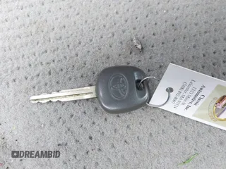 2003 Toyota Camry LE z VIN 4T1BE30K13U746690, wystawiony jako IAAI lot #42220794 z przebiegiem 165 807 mil mil oraz . Historia ofert i sprzedaży dostępna na DreamBid. Obrazek 11.