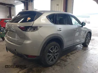 2018 Mazda CX-5 Grand Touring with VIN JM3KFBDM4J0350420, listed as a IAAI auction lot 41881566 with 96,515 mi miles. Bid and sale history available at carsss.com. Image 4.