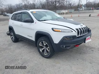 2015 Jeep Cherokee Trailhawk with VIN 1C4PJMBB7FW741365, listed as a IAAI auction lot 41879685 with 94,135 mi miles and . Bid and sale history available at carsss.com. Image 1.