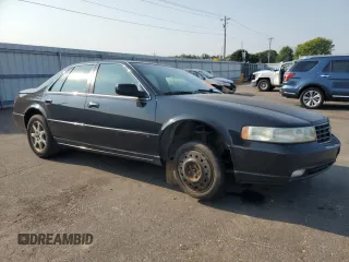 2002 Cadillac Seville Touring STS z VIN 1G6KY54922U210928, wystawiony jako Copart lot #71214564 z przebiegiem Nie podano mil oraz Tytuł czysty. Historia ofert i sprzedaży dostępna na DreamBid. Obrazek 4.