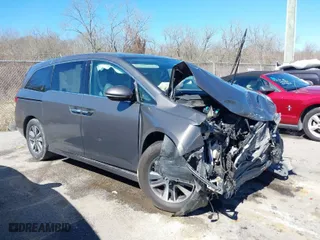 2016 Honda Odyssey Touring Elite with VIN 5FNRL5H97GB010275, listed as a IAAI auction lot 41655328 with 1 mi miles. Bid and sale history available at carsss.com. Image 1.