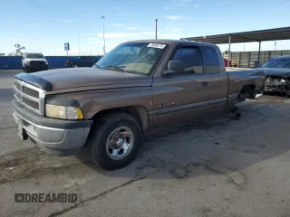 2000 Dodge 1500 with VIN 3B7HC13Z8YM241128, listed as a Copart auction lot 76496774 with 125,929 mi miles and Salvage Title. Bid and sale history available at DreamBid. Image 1.