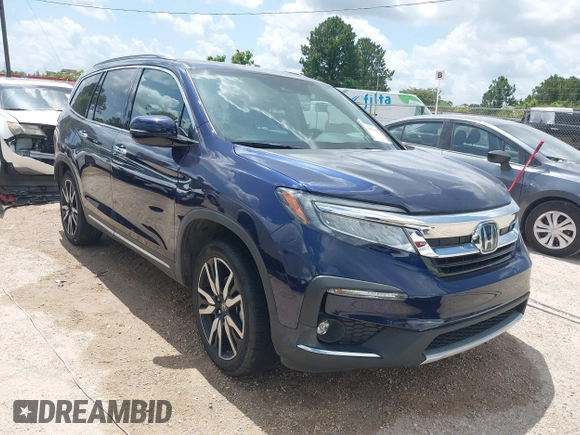 2022 Honda Pilot Touring 7-Passenger with VIN 5FNYF5H61NB019768, listed as a IAAI auction lot 42438780 with Not provided miles and . Bid and sale history available at DreamBid. Image 1.