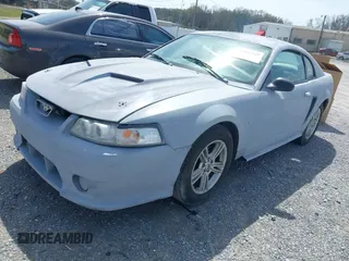 2003 Ford Mustang Standard with VIN 1FAFP40413F347912, listed as a IAAI auction lot 41842529 with 146,757 mi miles. Bid and sale history available at carsss.com. Image 2.