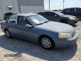 2003 Saturn LS z VIN 1G8JU54F43Y501252, wystawiony jako Copart lot #76197934 z przebiegiem 52 856 mil mil oraz Szkody całkowita. Historia ofert i sprzedaży dostępna na DreamBid. Obrazek 4.