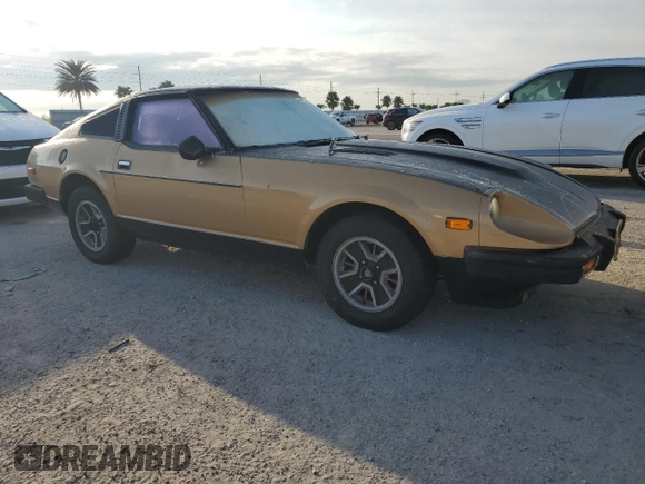 1980 Datsun 280ZX z VIN HS130221335, wystawiony jako Copart lot #76338304 z przebiegiem 135 266 mil mil oraz Szkody całkowita. Historia ofert i sprzedaży dostępna na DreamBid. Obrazek 4.