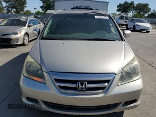 2005 Honda Odyssey EX-L z VIN 5FNRL386X5B407129, wystawiony jako Copart lot #56366655 z przebiegiem 181 893 mil mil oraz Szkoda całkowita • Salvage title. Historia ofert i sprzedaży dostępna na DreamBid. Obrazek 5.