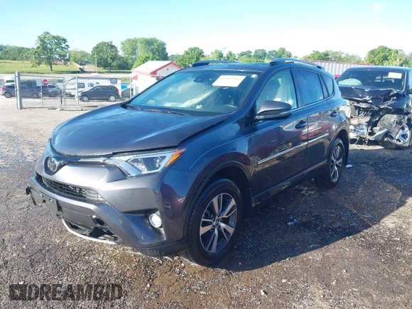 2018 Toyota RAV4 XLE z VIN JTMWFREV1JJ197662, wystawiony jako IAAI lot #42167382 z przebiegiem 64 826 mil mil oraz . Historia ofert i sprzedaży dostępna na DreamBid. Obrazek 2.