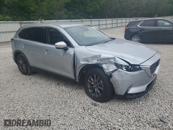 2022 Mazda CX-9 Touring with VIN JM3TCBCY6N0607357, listed as a Copart auction lot 54316745 with 66,888 mi miles and Salvage title. Bid and sale history available at DreamBid. Image 4.