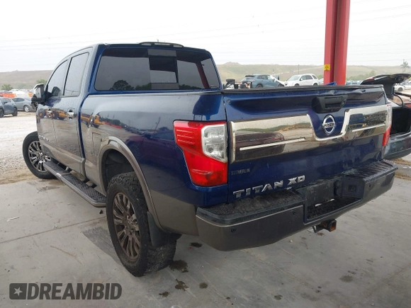 2016 Nissan Titan Platinum Reserve z VIN 1N6BA1F20GN509360, wystawiony jako IAAI lot #41921670 z przebiegiem 164 784 mil mil oraz . Historia ofert i sprzedaży dostępna na DreamBid. Obrazek 3.