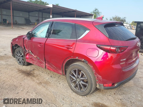 2017 Mazda CX-5 Grand Touring with VIN JM3KFADL8H0189033, listed as a IAAI auction lot 40029931 with 88,933 mi miles and . Bid and sale history available at carsss.com. Image 3.