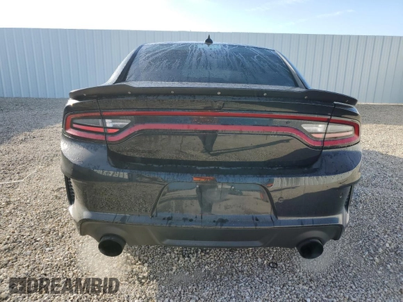 2021 Dodge Charger Scat Pack Widebody with VIN 2C3CDXGJ5MH637464, listed as a Copart auction lot 85671524 with 101,343 mi miles and Salvage Title. Bid and sale history available at carsss.com. Image 6.