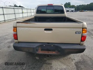 2002 Toyota Tacoma with VIN 5TEWM72N12Z093226, listed as a Copart auction lot 61019955 with 103,657 mi miles and Clean title. Bid and sale history available at DreamBid. Image 6.