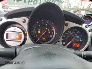 2009 Nissan 370Z z VIN JN1AZ44E19M400603, wystawiony jako Copart lot #79878474 z przebiegiem 129 976 mil mil oraz Szkoda całkowita • Salvage title. Historia ofert i sprzedaży dostępna na DreamBid. Obrazek 9.