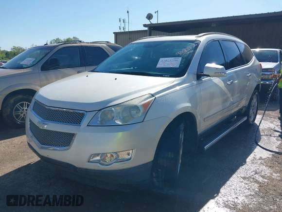2011 Chevrolet Traverse LTZ with VIN 1GNKVLED9BJ158896, listed as a IAAI auction lot 42023356 with 203,809 mi miles and . Bid and sale history available at DreamBid. Image 2.