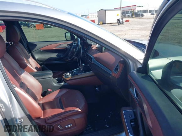 2016 Mazda CX-9 Signature with VIN JM3TCBEY7G0120023, listed as a IAAI auction lot 42431039 with 160,276 mi miles and . Bid and sale history available at DreamBid. Image 5.