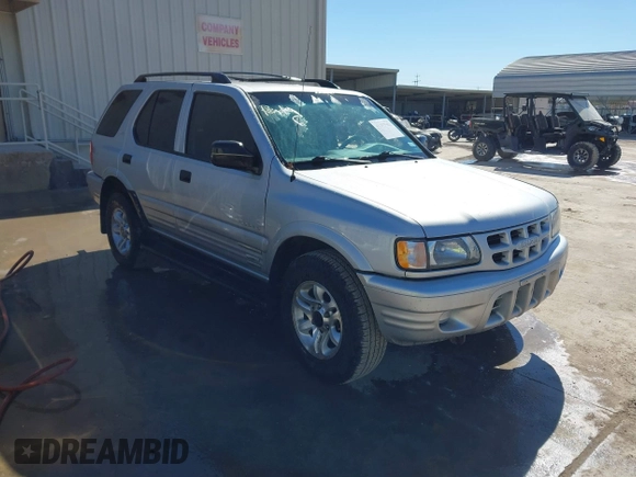 2002 Isuzu Rodeo S with VIN 4S2CK58WX24321556, listed as a IAAI auction lot 41405981 with 172,590 mi miles and . Bid and sale history available at DreamBid. Image 1.