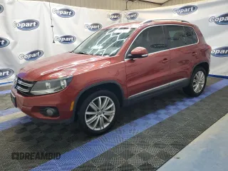 2012 Volkswagen Tiguan SE z VIN WVGAV7AX9CW002143, wystawiony jako Copart lot #55820395 z przebiegiem 174 356 mil mil oraz Czysty tytuł • Clean title. Historia ofert i sprzedaży dostępna na DreamBid. Obrazek 1.