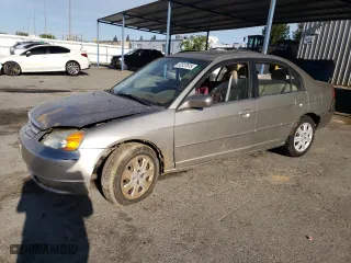 2003 Honda Civic EX with VIN 2HGES26723H510318, listed as a Copart auction lot 52037615 with 210,140 mi miles and Salvage Title. Bid and sale history available at carsss.com. Image 1.
