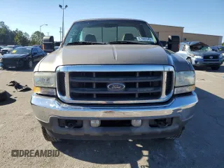 2002 Ford F-250 XL with VIN 1FTNF21L02EA83007, listed as a Copart auction lot 87880345 with 104,889 mi miles and Salvage title. Bid and sale history available at DreamBid. Image 5.