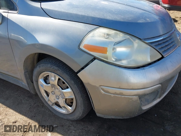 2007 Nissan Versa 1.8 SL with VIN 3N1BC11E37L432291, listed as a IAAI auction lot 41357144 with 136,039 mi miles. Bid and sale history available at carsss.com. Image 6.