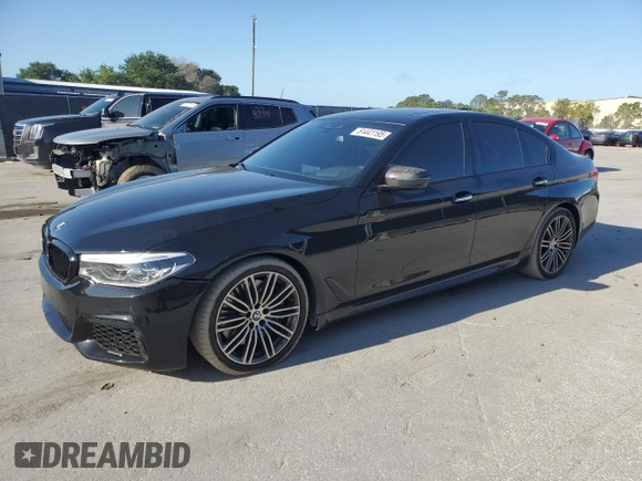 2018 BMW 5 Series M550i xDrive with VIN WBAJB9C52JB035913, listed as a Copart auction lot 51441195 with 42,205 mi miles and Salvage Title. Bid and sale history available at carsss.com. Image 1.