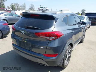 2017 Hyundai Tucson Value with VIN KM8J33A26HU385271, listed as a IAAI auction lot 42090148 with 95,170 mi miles. Bid and sale history available at carsss.com. Image 4.