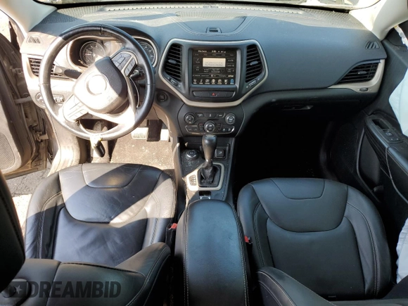 2014 Jeep Cherokee Limited with VIN 1C4PJMDB2EW215897, listed as a Copart auction lot 59576765 with 107,071 mi miles and Salvage title. Bid and sale history available at DreamBid. Image 8.