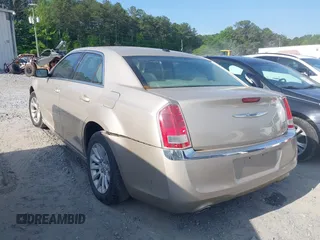 2012 Chrysler 300 with VIN 2C3CCAAG8CH261449, listed as a IAAI auction lot 42126170 with 189,961 mi miles and . Bid and sale history available at DreamBid. Image 3.