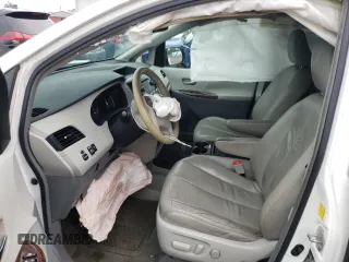 2011 Toyota Sienna XLE AAS with VIN 5TDYK3DCXBS063948, listed as a Copart auction lot 59776695 with 305,799 mi miles and Salvage title. Bid and sale history available at DreamBid. Image 7.