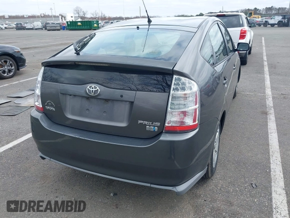 2007 Toyota Prius z VIN JTDKB20U073266399, wystawiony jako IAAI lot #41947176 z przebiegiem 186 258 mil mil oraz . Historia ofert i sprzedaży dostępna na DreamBid. Obrazek 4.