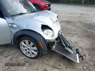 2007 MINI Hardtop S with VIN WMWMF73537TL88038, listed as a IAAI auction lot 42200252 with 70,603 mi miles and . Bid and sale history available at DreamBid. Image 6.