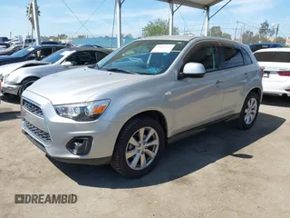 2014 Mitsubishi Outlander Sport ES with VIN 4A4AP3AUXEE003879, listed as a IAAI auction lot 41862379 with 65,297 mi miles. Bid and sale history available at carsss.com. Image 2.