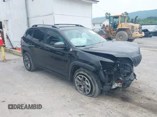 2021 Jeep Cherokee Trailhawk with VIN 1C4PJMBX0MD167941, listed as a IAAI auction lot 42507379 with 70,414 mi miles and . Bid and sale history available at DreamBid. Image 1.