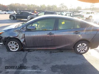 2017 Toyota Prius Two z VIN JTDKARFU4H3042976, wystawiony jako IAAI lot #41740418 z przebiegiem 66 734 mil mil oraz . Historia ofert i sprzedaży dostępna na DreamBid. Obrazek 14.