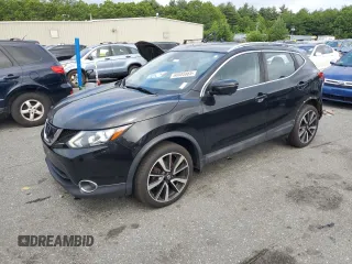 2017 Nissan Rogue SV with VIN JN1BJ1CR2HW107004, listed as a Copart auction lot 60085665 with 112,444 mi miles and Salvage title. Bid and sale history available at DreamBid. Image 1.