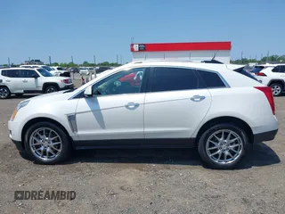 2013 Cadillac SRX Performance Collection z VIN 3GYFNDE35DS578495, wystawiony jako IAAI lot #42323061 z przebiegiem 160 473 mil mil oraz . Historia ofert i sprzedaży dostępna na DreamBid. Obrazek 14.