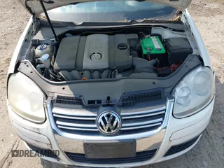 2007 Volkswagen Jetta 2.5 z VIN 3VWRG71K77M062978, wystawiony jako IAAI lot #42415517 z przebiegiem 168 159 mil mil oraz . Historia ofert i sprzedaży dostępna na DreamBid. Obrazek 10.