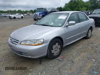 2002 Honda Accord LX z VIN 1HGCG16402A048301, wystawiony jako IAAI lot #42196218 z przebiegiem 254 138 mil mil oraz . Historia ofert i sprzedaży dostępna na DreamBid. Obrazek 2.