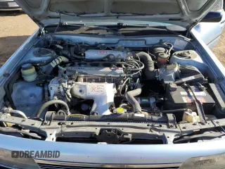 1990 Toyota Camry z VIN 4T1SV24E0LU137556, wystawiony jako Copart lot #84628404 z przebiegiem 247 203 mil mil oraz Czysty tytuł • Clean title. Historia ofert i sprzedaży dostępna na DreamBid. Obrazek 11.