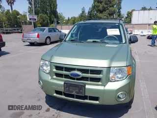2009 Ford Escape Hybrid z VIN 1FMCU49329KA08605, wystawiony jako IAAI lot #42367265 z przebiegiem 166 562 mil mil oraz . Historia ofert i sprzedaży dostępna na DreamBid. Obrazek 6.