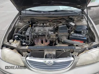 1999 Mazda 626 ES with VIN 1YVGF22C8X5900510, listed as a IAAI auction lot 41479213 with 178,182 mi miles. Bid and sale history available at carsss.com. Image 10.