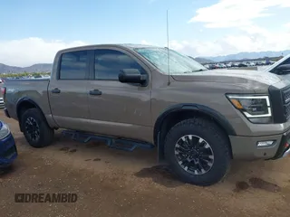 2021 Nissan Titan Pro-4X with VIN 1N6AA1ED9MN519749, listed as a IAAI auction lot 41948962 with 65,807 mi miles and . Bid and sale history available at DreamBid. Image 13.
