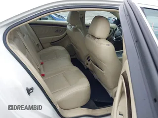 2015 Ford Taurus Limited with VIN 1FAHP2F85FG117635, listed as a IAAI auction lot 41979311 with 104,314 mi miles. Bid and sale history available at carsss.com. Image 8.