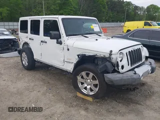 2015 Jeep Wrangler Unlimited Sahara with VIN 1C4BJWEG0FL526800, listed as a IAAI auction lot 42040667 with 138,794 mi miles and . Bid and sale history available at DreamBid. Image 1.