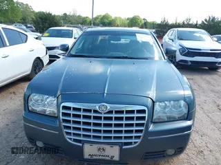 2005 Chrysler 300 with VIN 2C3AA53G35H157083, listed as a IAAI auction lot 41945392 with 192,215 mi miles. Bid and sale history available at carsss.com. Image 12.