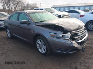 2013 Ford Taurus SEL z VIN 1FAHP2E84DG193376, wystawiony jako IAAI lot #41661721 z przebiegiem 136 341 mil mil oraz . Historia ofert i sprzedaży dostępna na DreamBid. Obrazek 1.